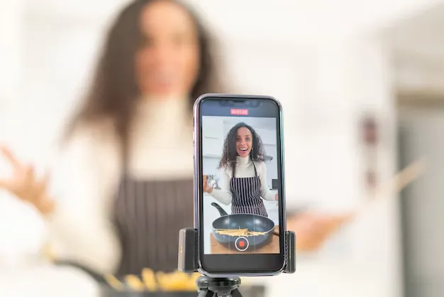 Girl creating a live video on her phone for social media 