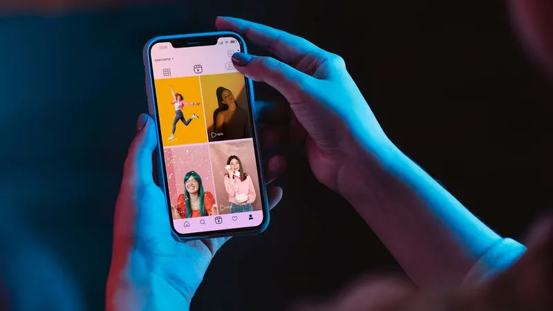 Woman holds phone and look Instagram photo