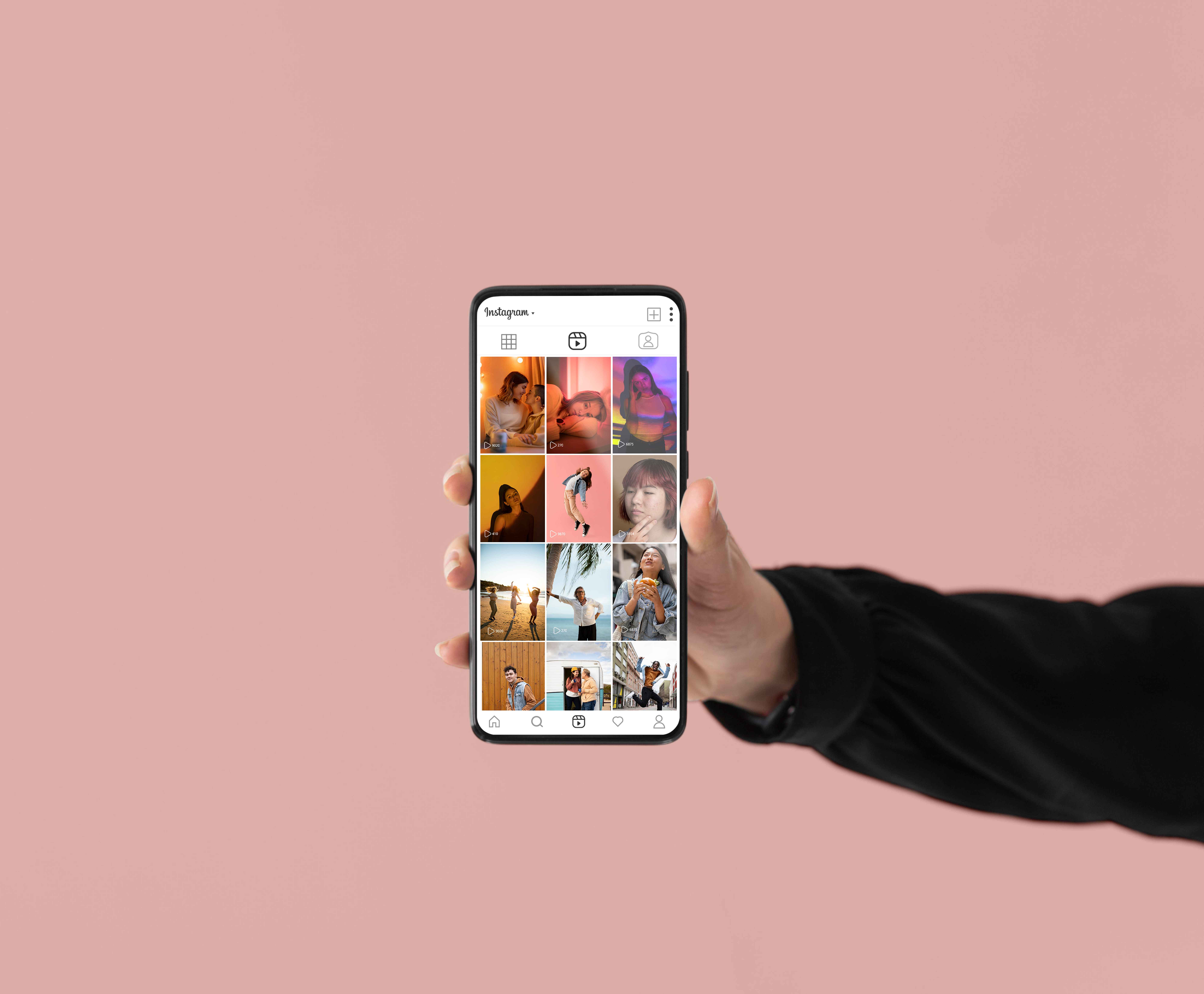 Close-up of a hand holding a phone with an Instagram account open
