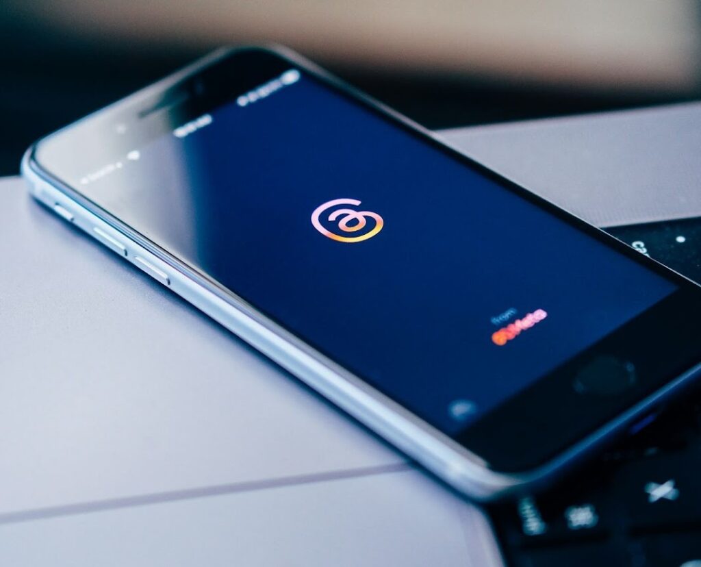 Threads logo displayed on a smartphone screen.